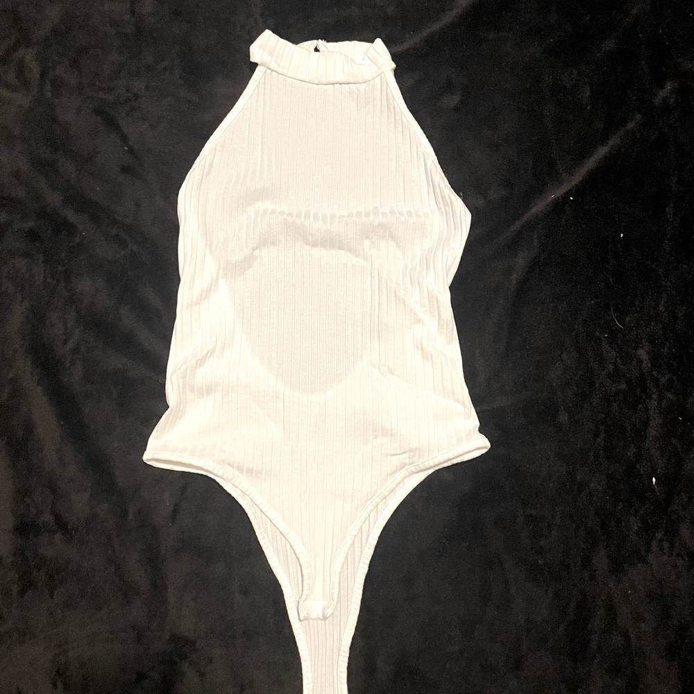 White bodysuit, high neck
